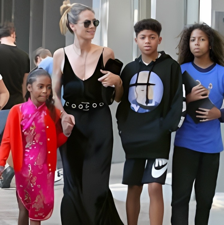 Johan Riley Fyodor Taiwo Samuel with his mother and two of the siblings.